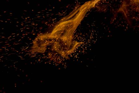flame of fire with sparks on a black background