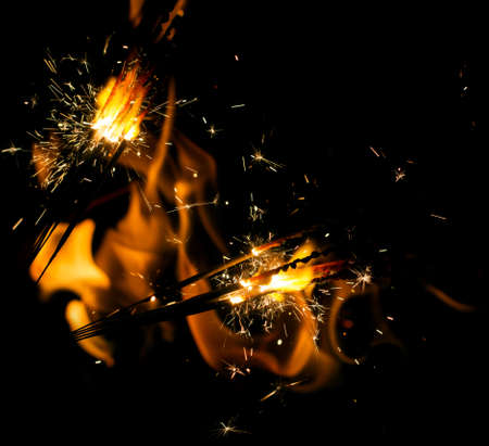 fire flames with sparks on a black backgroundの写真素材
