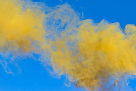 yellow on blue sky backgroundの写真素材