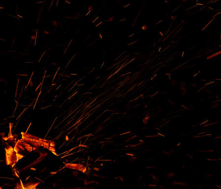 flame fire with sparks on black background
