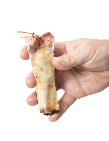 man eating smoked pork ribの写真素材