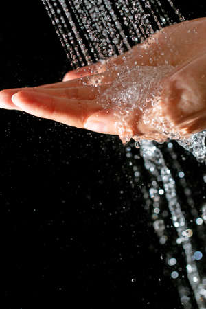 hands under running waterの写真素材
