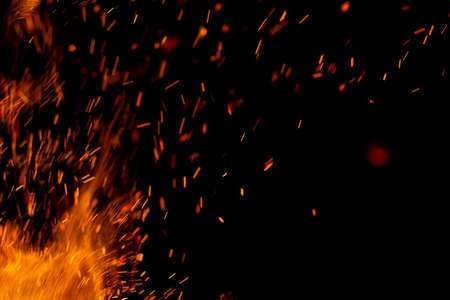 flame of fire with sparks on a black background