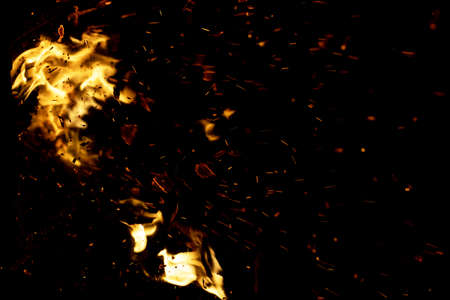 flame fire with sparks on black background