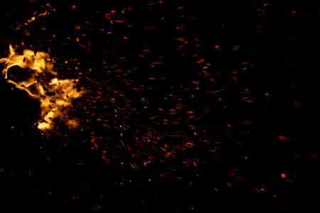 flame fire with sparks on black background