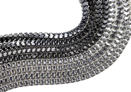 braided silver chain on white backgroundの写真素材