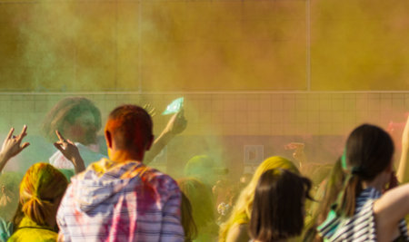 hands of people on the background of colored paintsの写真素材