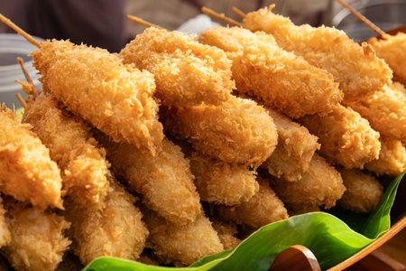 fried shrimp in batter as a backgroundの写真素材