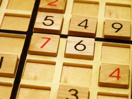 Wood sudoku board and tiles.の写真素材