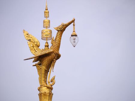 Golden swan electric lamp post on  in Thailand.の写真素材