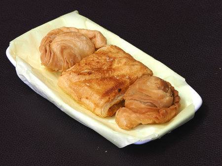 Curry puff and pie on dish - fried dessertの写真素材