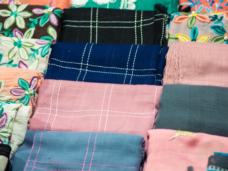 Colorful fabric or scarf  texture, sale in market, homemade
