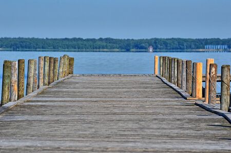 A wooden jetty by the seaの写真素材