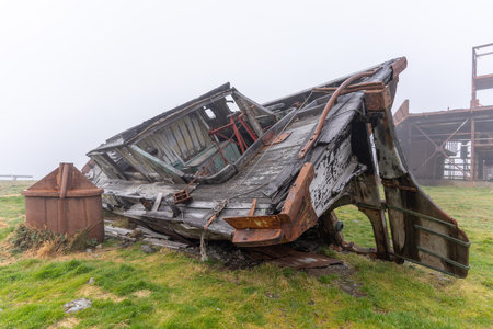 Old, rusty whaling ships and processing facilities at a now abandoned whaling station in Grytviken -on the island of South Georgia.の写真素材