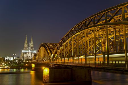 River Rhine, Bridge and Cologne Cathedral in Germany at Nightの写真素材