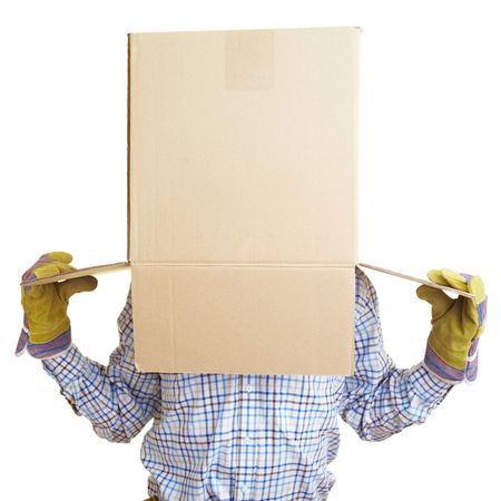 Worker putting a cardboard box on his headの写真素材