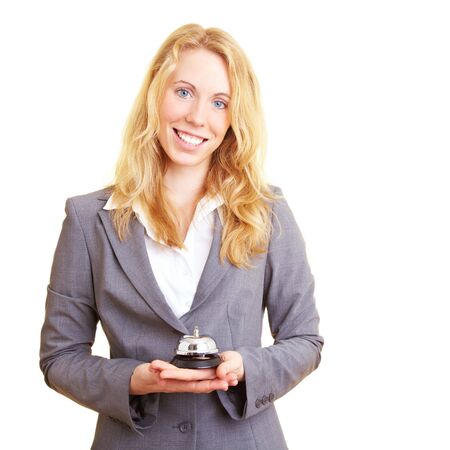 Woman in a business suit with hotel bellの写真素材