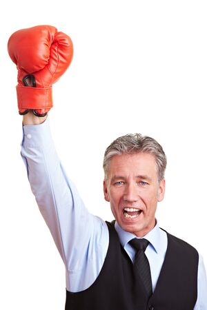 Sucessful manager cheering with a red boxing gloveの写真素材