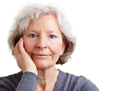 Serious senior woman looking into the camera