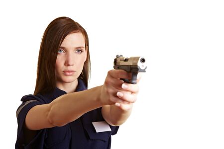 Female policer officer aiming her service weapon