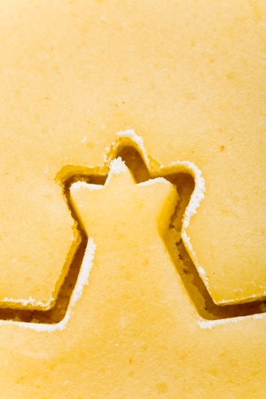 Part of a christmas star shape in raw cookie doughの写真素材