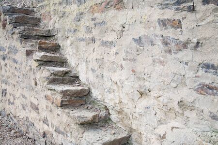 Old stair steps in many withered slate stonesの写真素材