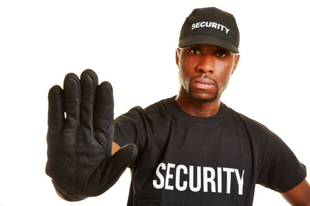 Security guard keeping distance with his hand