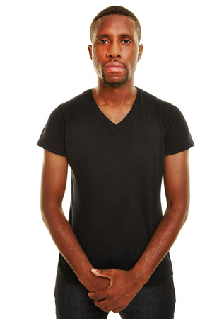 Young casual african man with neutral face in front viewの写真素材