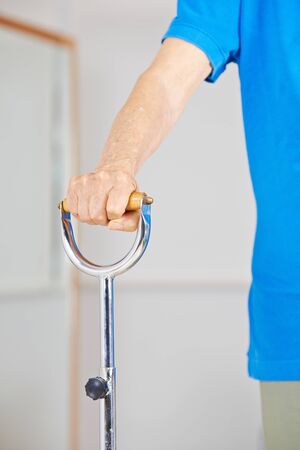 Old woman with walker support in physiotherapyの写真素材