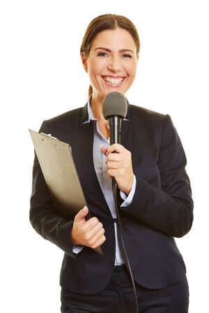 Smiling female media journalist with microphone and clipboardの写真素材