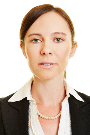 Neutral face of business woman for frontal head shotの写真素材