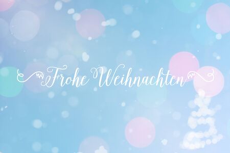 Christmas postcard in blue with slogan in german "Frohe Weihnachten" (Merry Christmas)の写真素材