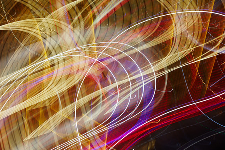 Abstract colorful light trails background at night
