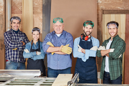 Carpenters team standing proud as a groupの写真素材