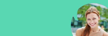 Panorama of woman in green speech bubble as communication conceptの写真素材