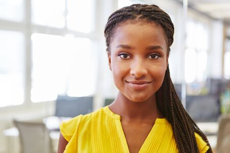 Young african woman as student trainee in business apprenticeship