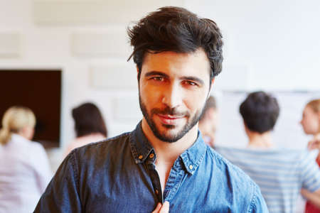 Young Man as start-up entrepreneur looking confindentlyの写真素材