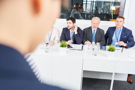 Business team in seminar lecture presentation at assessment center