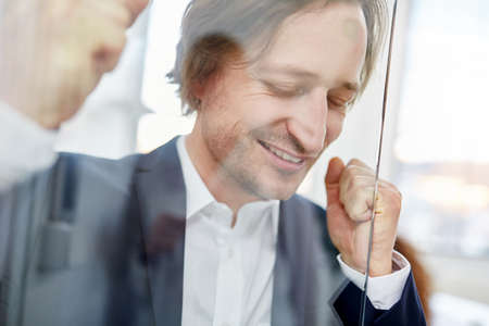 Businessman having a new creative idea and getting inspiration