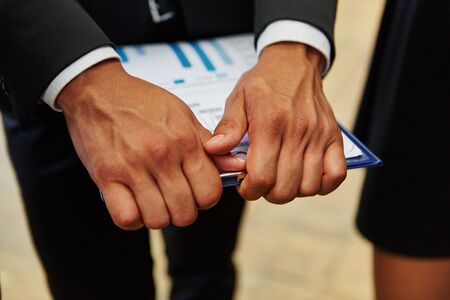 Document on clipboard for business controlling in consulting agencyの写真素材