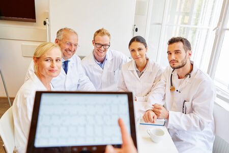 Doctors in ECG training learning about diagnose analysisの写真素材