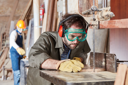 Band saw used with accuracy by carpenterの写真素材