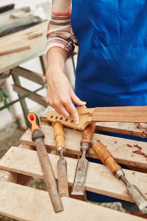 Many tools at carpenter's workshop table