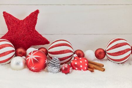 Christmas greeting card with red and white decorationの写真素材