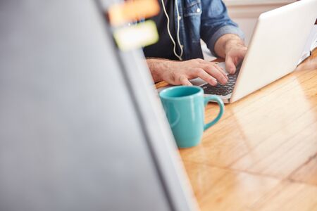 Programmer with laptop computer writing  about computer science
