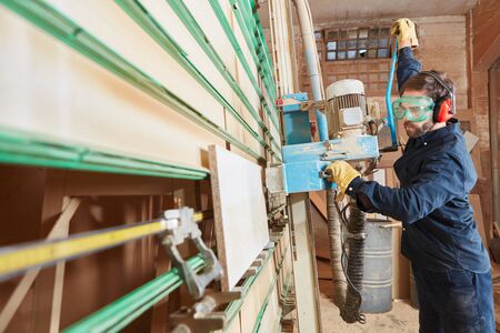 Man working with plate saw during apprenticeship