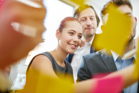 Brainstorming with many notes in different colorsの写真素材