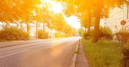 Empty road with roadside curb in Hamburg in summerの写真素材
