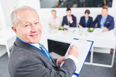 Senior citizen as experienced chief executive or boss gives lectureの写真素材