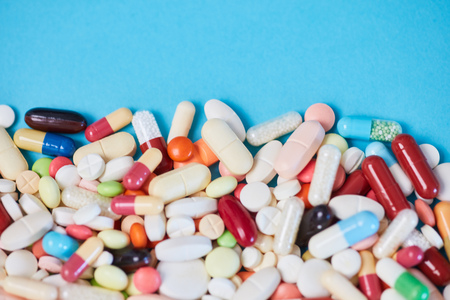 Many different colorful medicines as pharmacies background with copy spaceの写真素材
